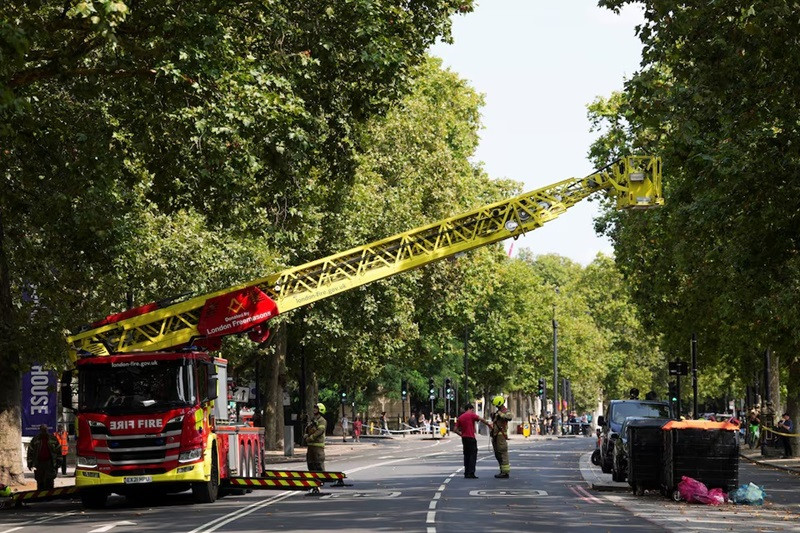 Firefighters stand following a fire at Somerset House in London, Britain August 17, 2024. PHOTO: REUTERS